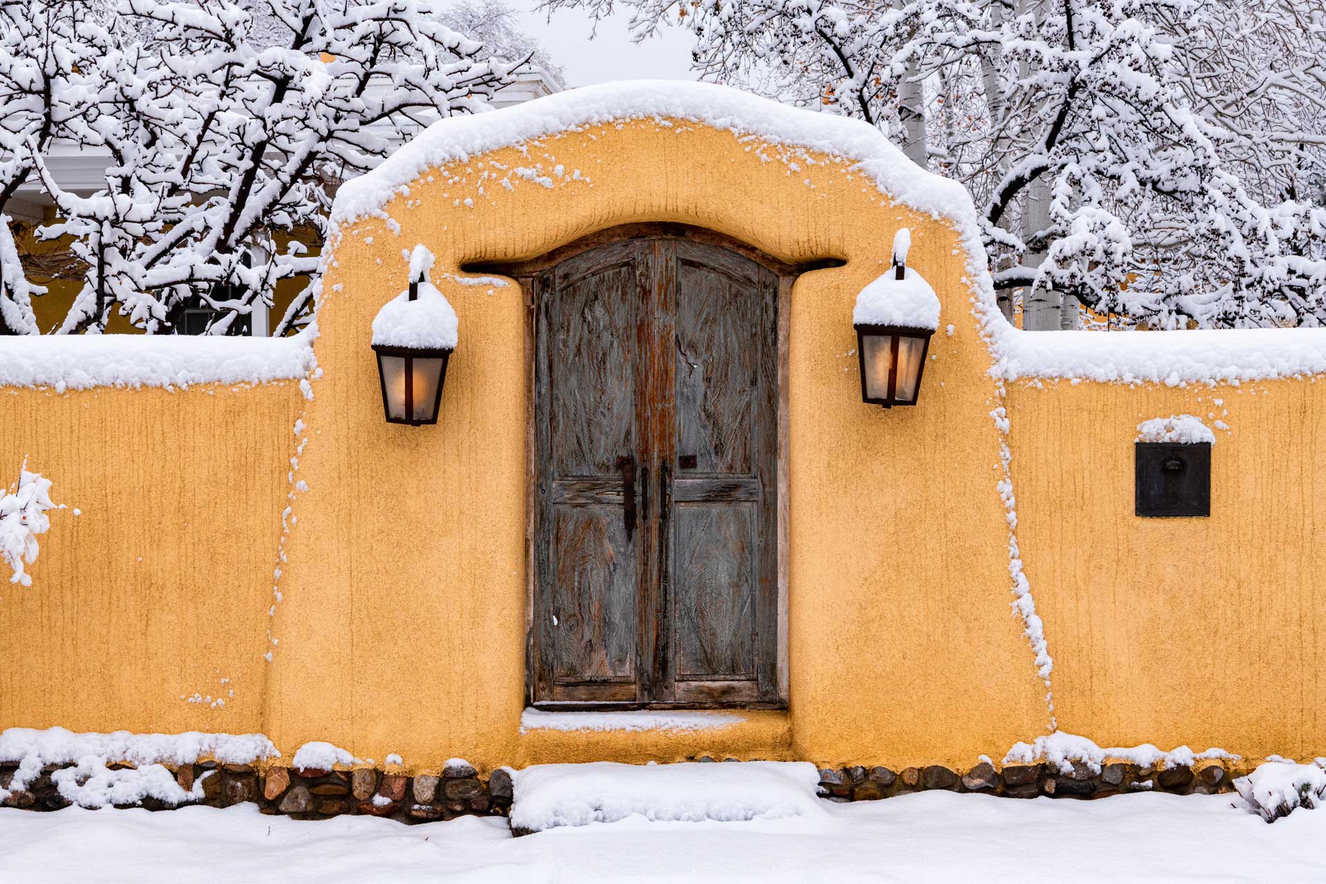 Snow on adobe building in Santa Fe, New Mexico
